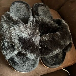 Black fuzzy slippers size Large Never worn